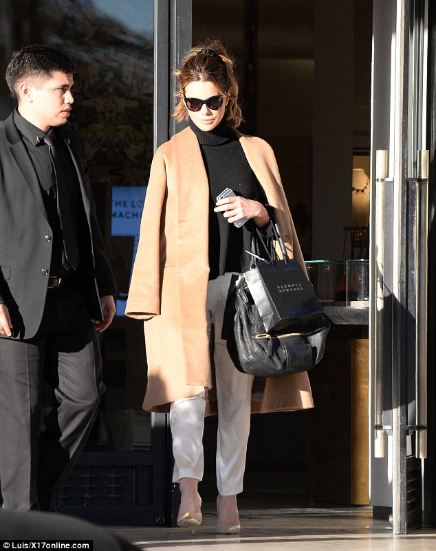 sophisticated kate beckinsale had all eyes on her as she left barneys new york while