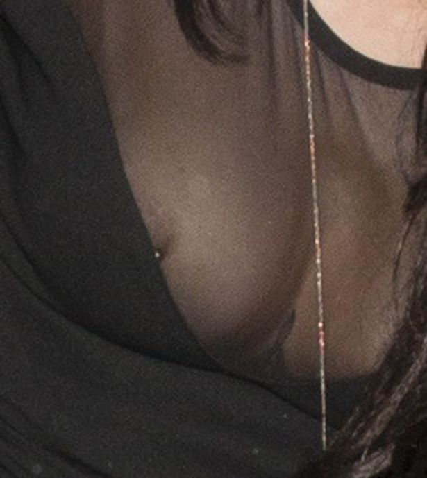 stephanie davis flashes pierced nipple as she heads to hotel with