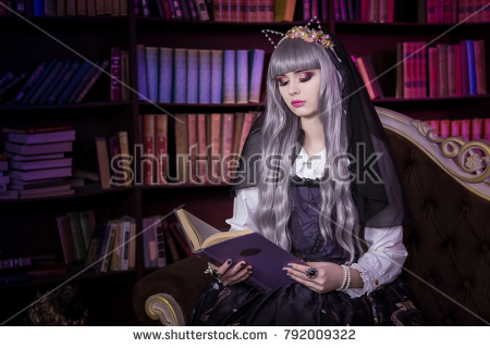 stock photo a beautiful woman in the shape of a lolita a doll with cat ears sitting on a sofa in a library 1
