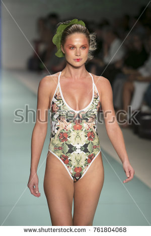 stock photo a model walks the runway for mister summer fashion show during art heart and fashion swim 13