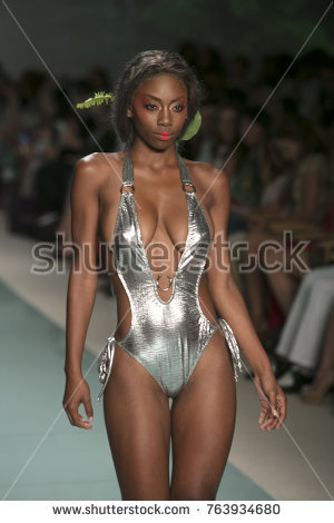 stock photo a model walks the runway for mister summer fashion show during art heart and fashion swim 6