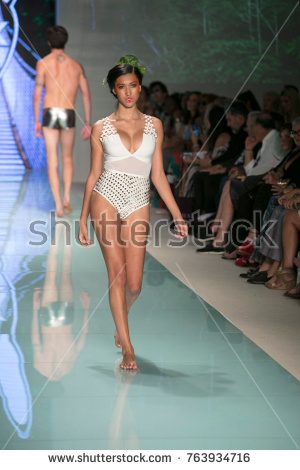 stock photo a model walks the runway for mister summer fashion show during art heart and fashion swim 8