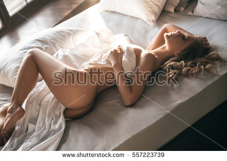 stock photo daring dreams top view of gorgeous young naked woman covered white sheet sleeping while lying