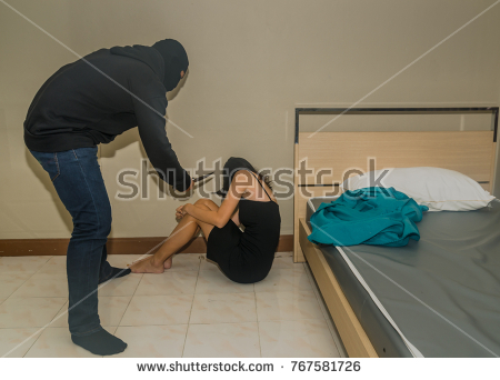 stock photo fear woman sitting on ground with thief or robber standing in front of abuse concept sexual 1