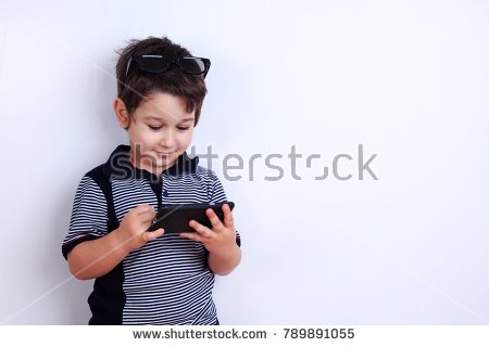 stock photo little boy using mobile phone child playing on smartphone technology mobile apps children