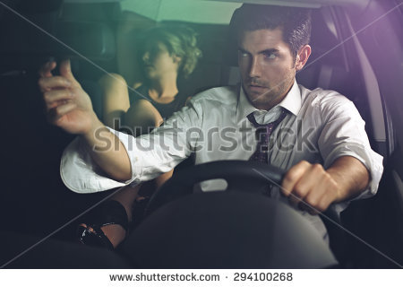 stock photo private driver looks beautiful woman in rear view mirror seduction and sensuality