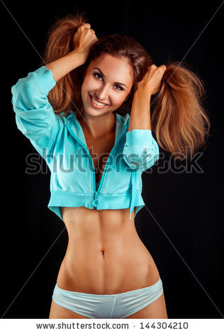 stock photo vertical photo of funny girl with brown hair in studio