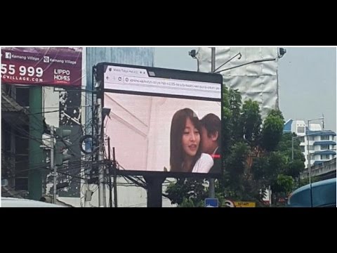 stuck in traffic in indonesia a year old it worker hacked an electronic billboard to air japanese flick watch tokyo hot