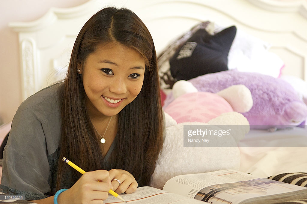 teen doing homework picture