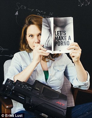 the director at work erika brandishes a book called lets make a porno