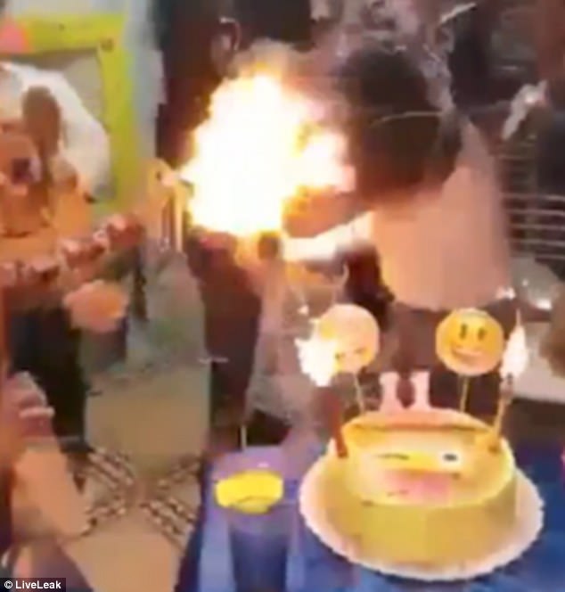 the girls family rush to pat down the flames after the birthday party turned into