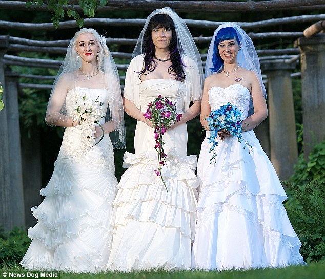 the married lesbian threesome on their wedding day in august