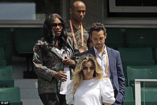 there for one another serena walking down the steps at roland garros whjere she