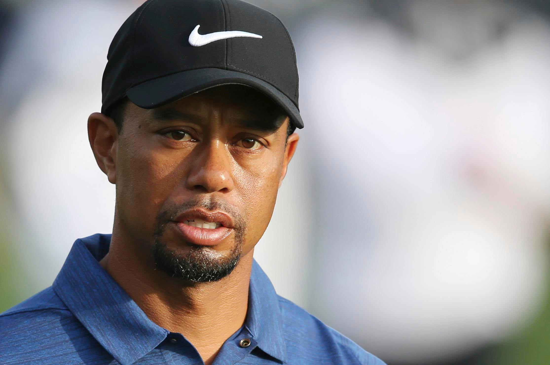 tiger woods is threatening to take a celebrity gossip website to court for leaking a nude