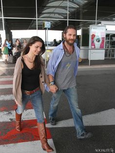 tom hardy and charlotte riley are all smiles as they arrive in nice airport attend