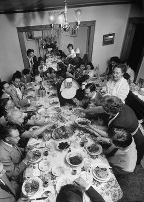 vintage photo of an italian family having dinner this reminds me of families holiday