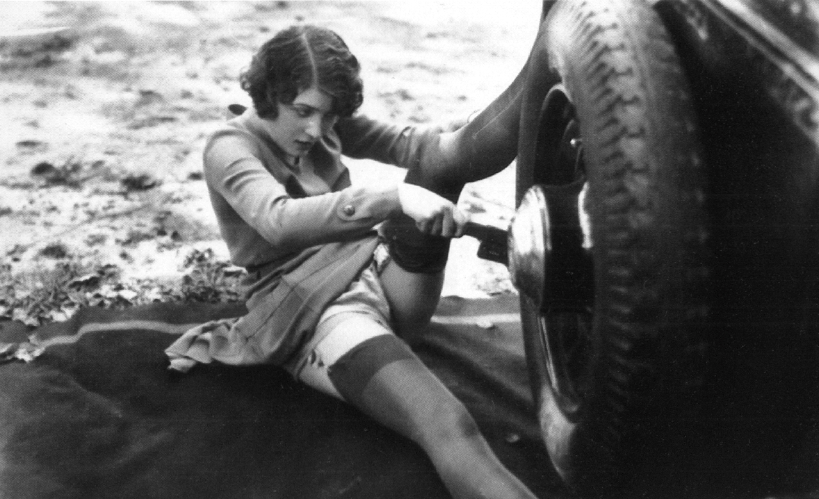 woman fixing car vintage porn post image