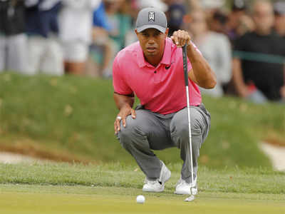 woods was living minute to minute with back injury golf news times of india