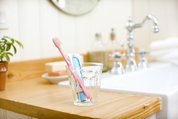 you should take your toothbrush out of the bathroom