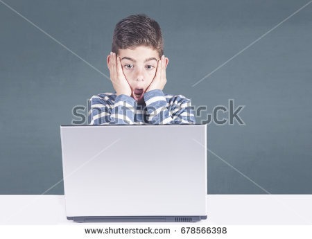 young boy reacts after watching inappropriate content while surfing the internet safety and parental