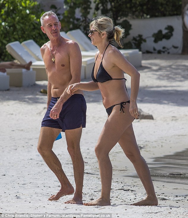 zoe ball wows in black bikini alongside her husband fatboy slim